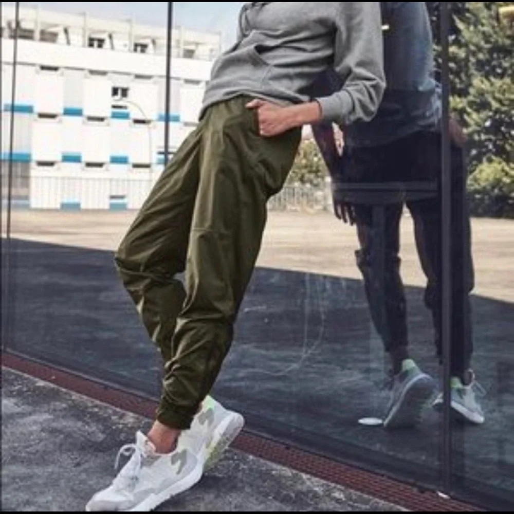 Athleta Radiant High Rise Radiant Zipper Jogger Pant Tortuga Olive Green 8P - Picture 1 of 10